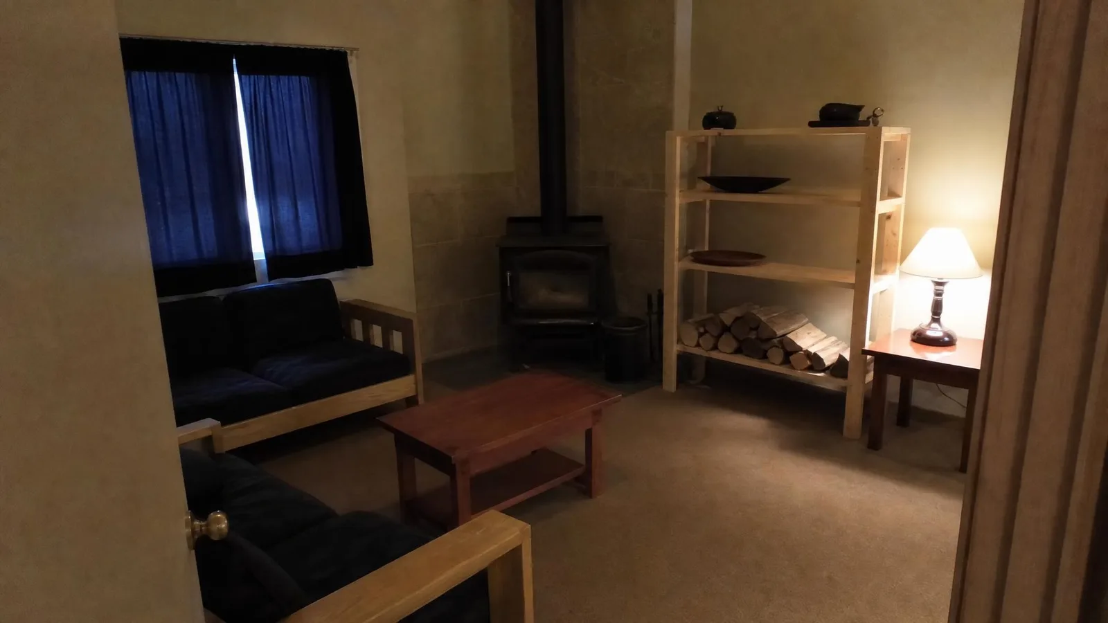 Source photo of a rental apartment living room, 1 of 3, taken on a phone