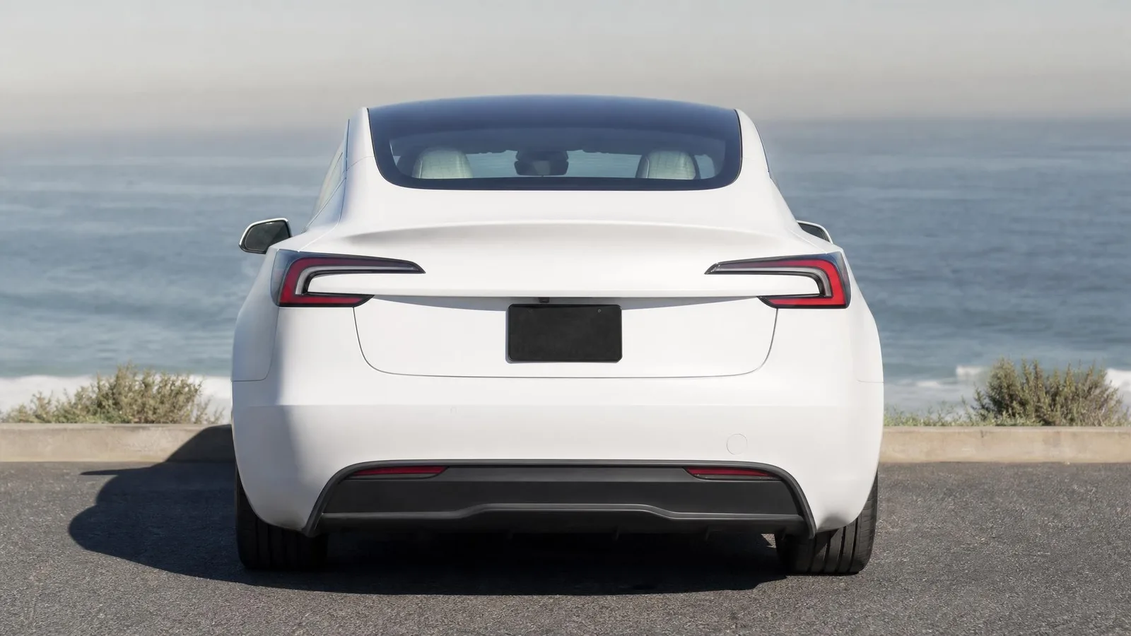 Phoxel result for a white electric sedan, 2 of 4, generated from the source photos