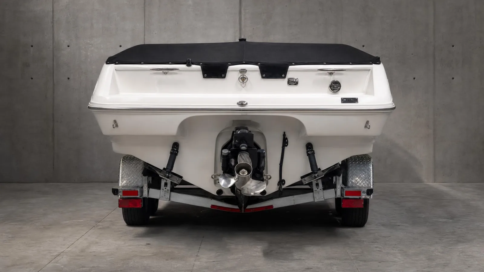 Phoxel result for a white speedboat on its trailer, 3 of 3, generated from the source photos