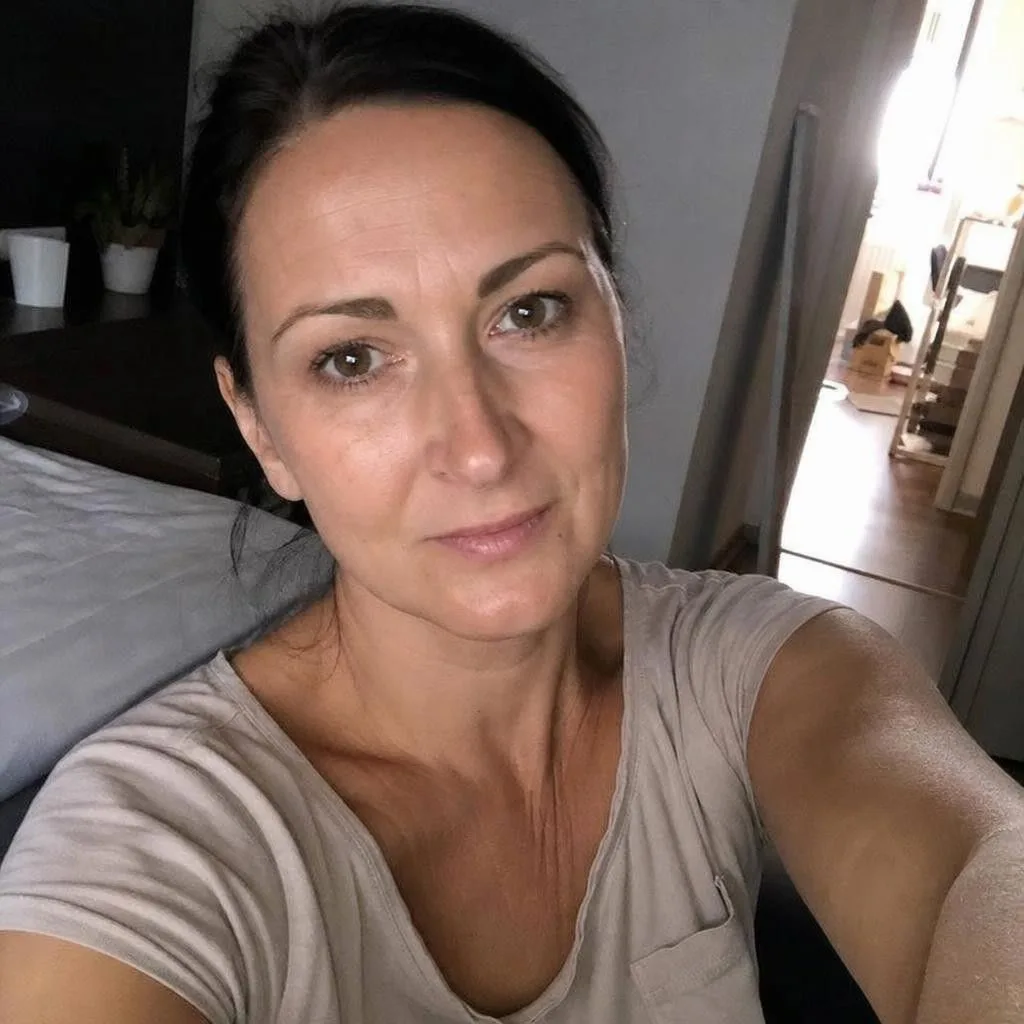 Source photo of a dark-haired woman in her forties, 2 of 2, taken on a phone
