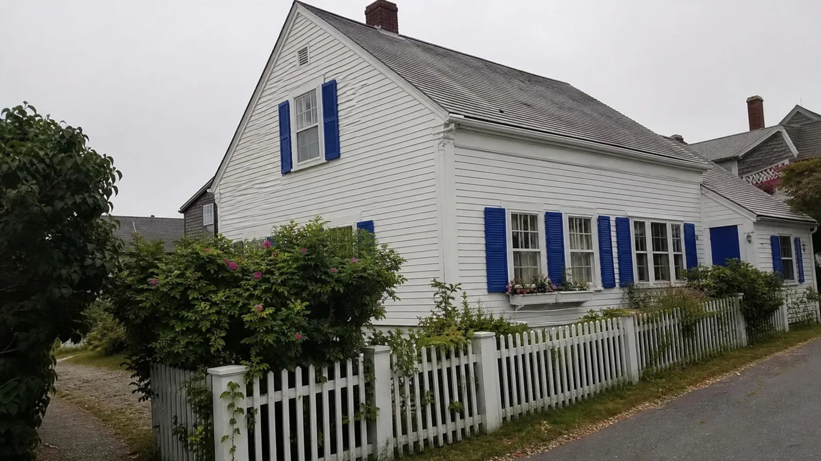 Source photo of a white clapboard cottage, 1 of 1, taken on a phone