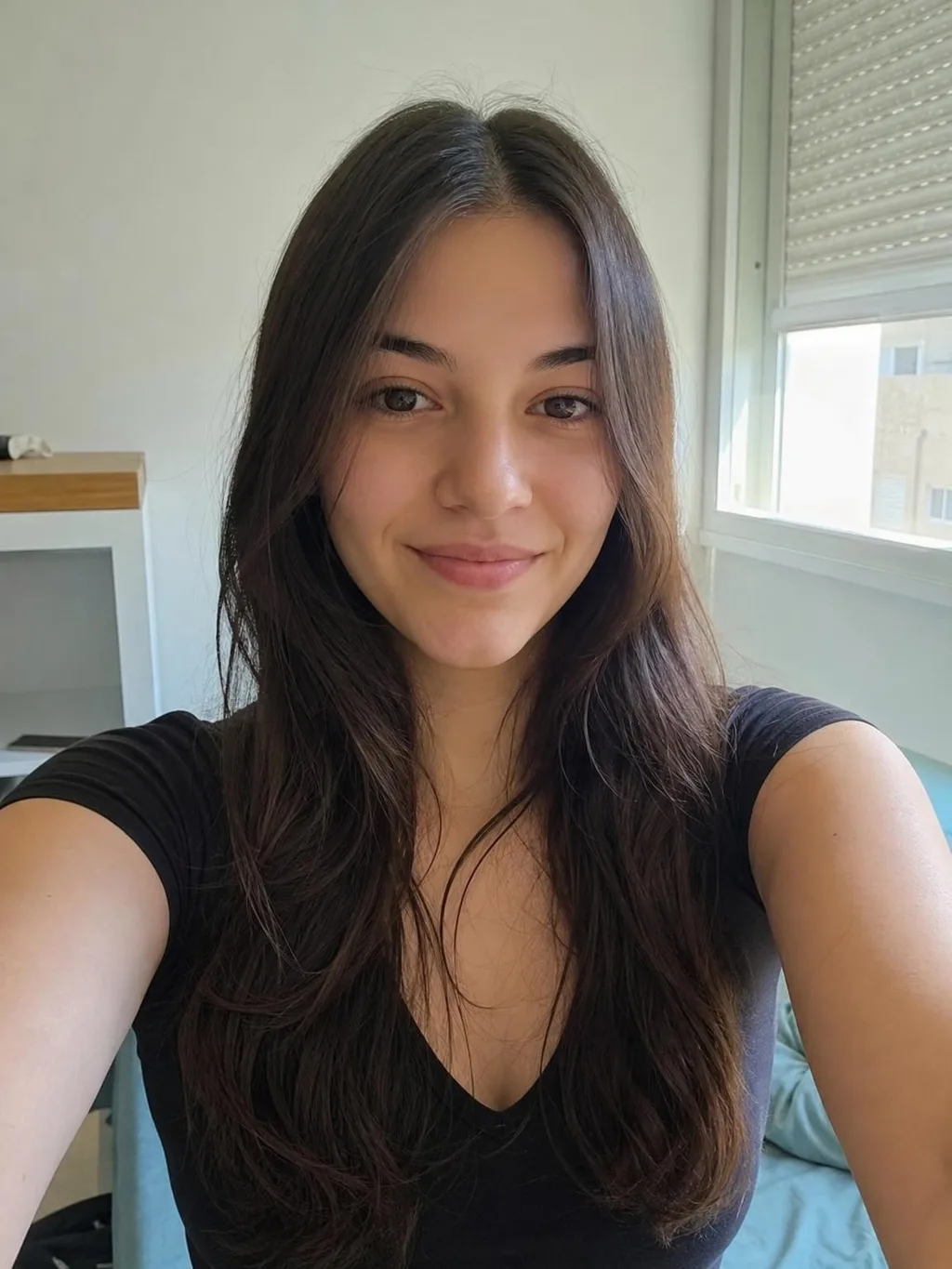 Source photo of a woman with long dark hair, 1 of 1, taken on a phone