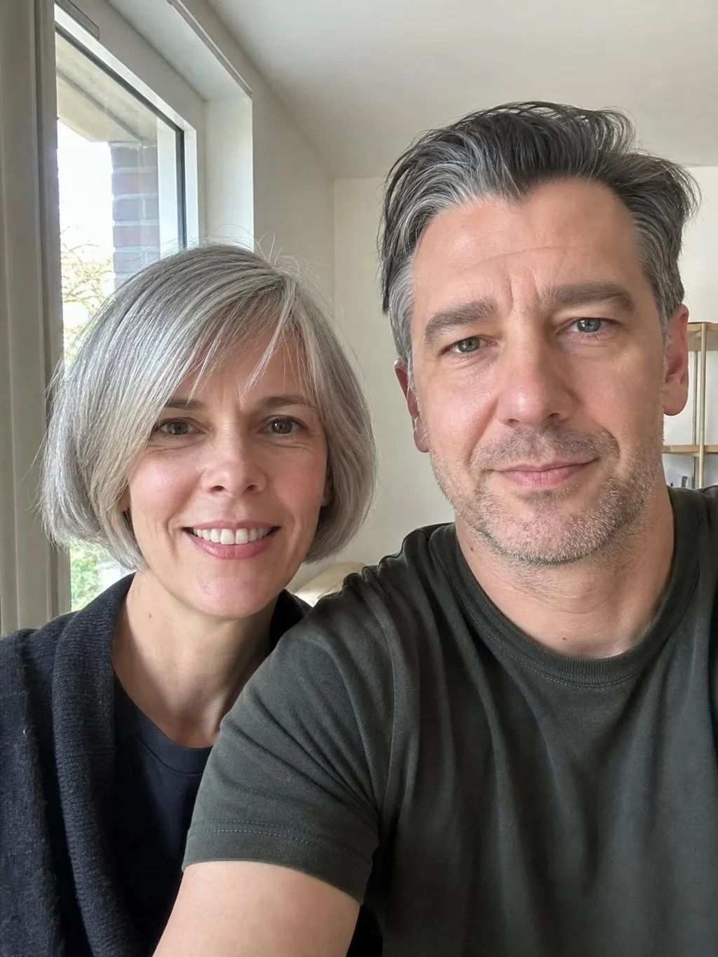 Source photo of a silver-haired couple, 1 of 1, taken on a phone