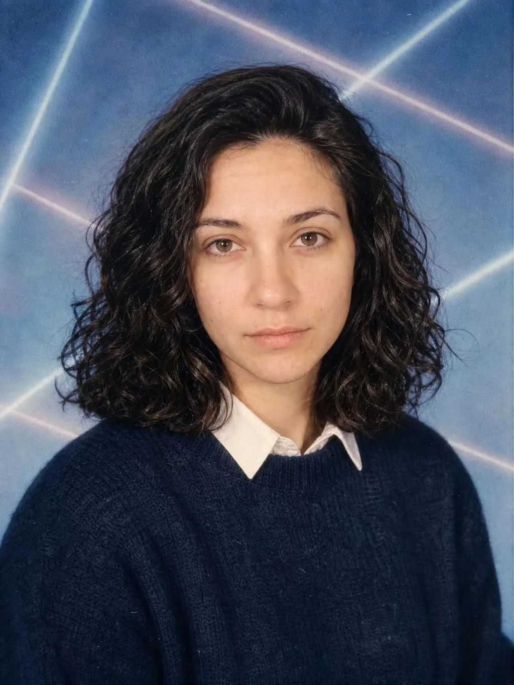 Phoxel result for a young woman with dark curly hair, 2 of 2, generated from the source photos